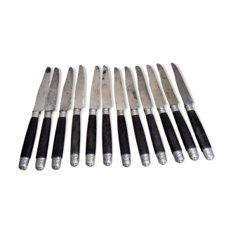 12 Silver dessert knives, ebony, steel, late 19th century