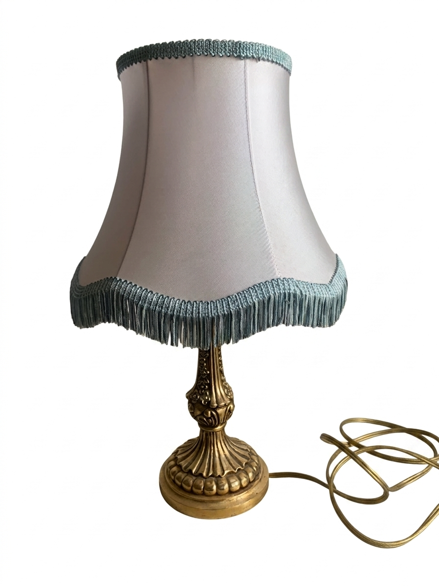 Vintage Neo-Rococo bedside lamp with fringed shade.