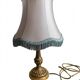 Vintage Neo-Rococo bedside lamp with fringed shade.