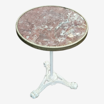 Old round marble bistro table