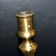Antique octagonal candlestick in Regency bronze from the 19th century.