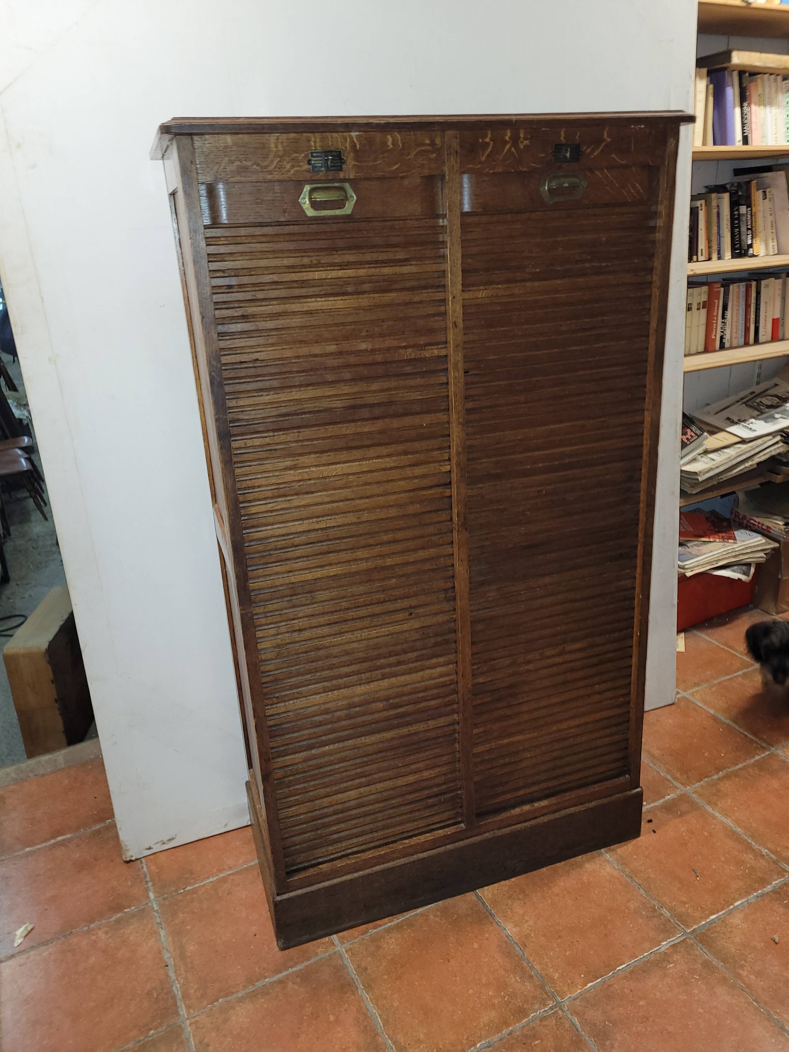 Old double curtained oak filing cabinet