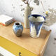 Enamelled sandstone vase