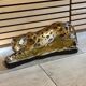 Vintage decorative ceramic sculpture representing a leopard.