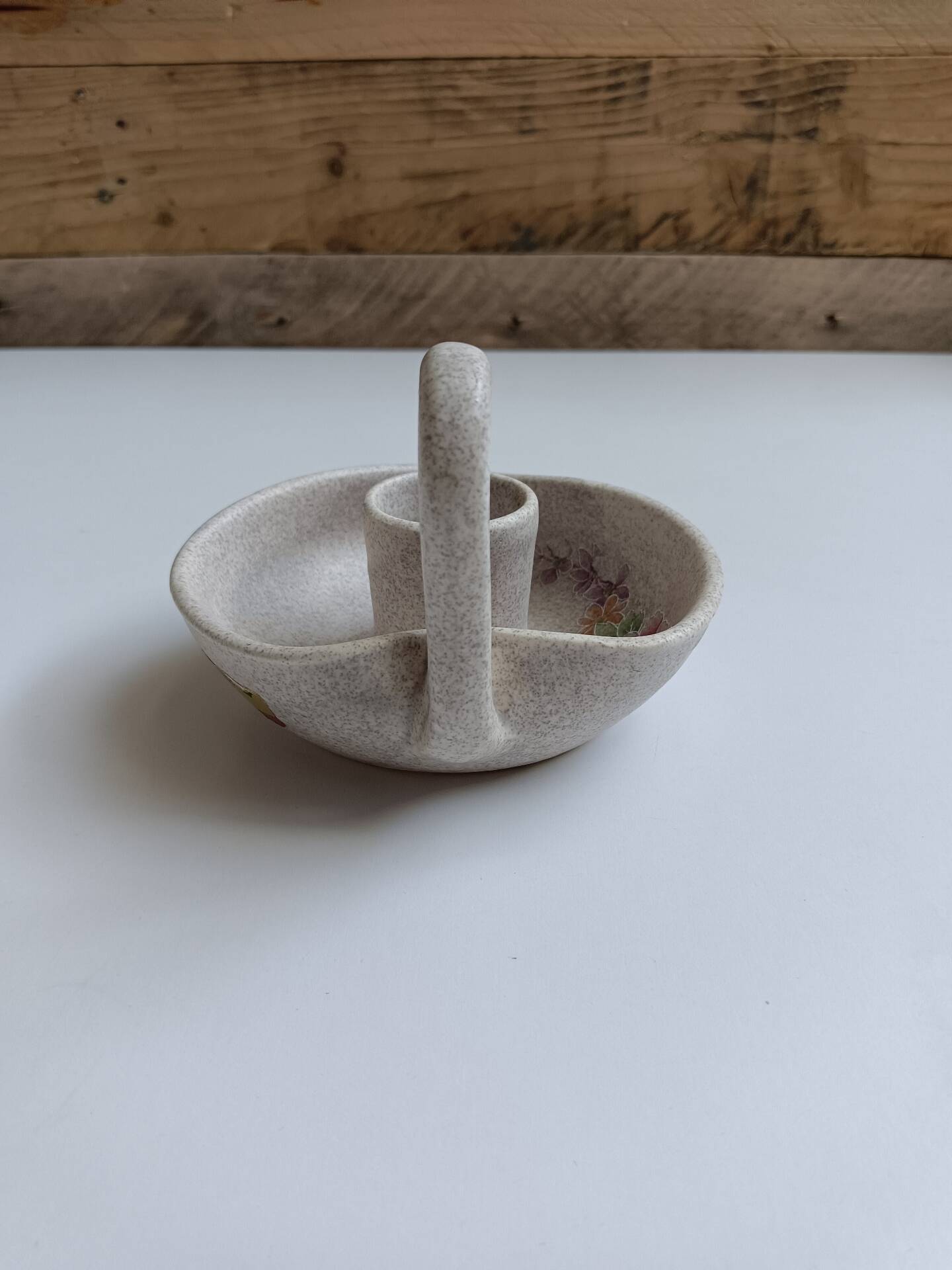 Vallauris grey candle holder with pink flowers, signed.