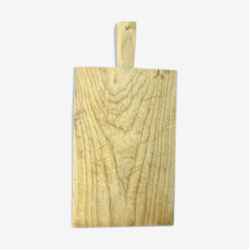 Wooden cutting board.