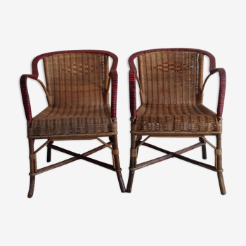 Vintage old rattan armchair duo