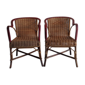 Vintage old rattan armchair duo