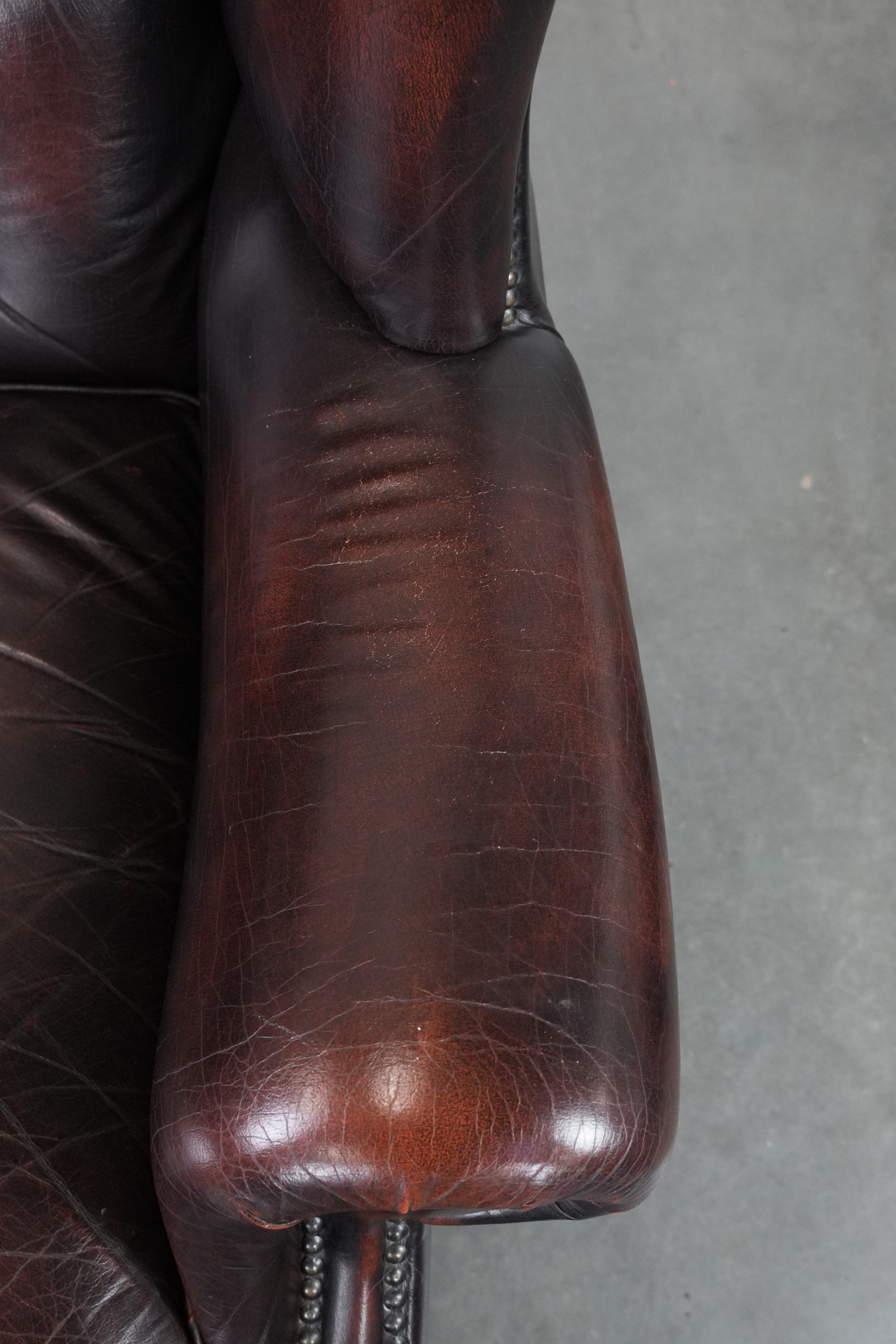 Cowhide leather Chesterfield wingback armchair in classic English style
