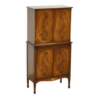 Flamed mahogany and satin drinks cabinet in Sheraton Revival style.