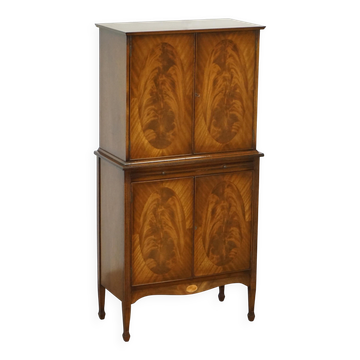 Flamed mahogany and satin drinks cabinet in Sheraton Revival style.