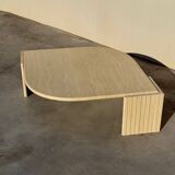 Large designer coffee table in travertine, eye shape, Roche Bobois edition from the 80s