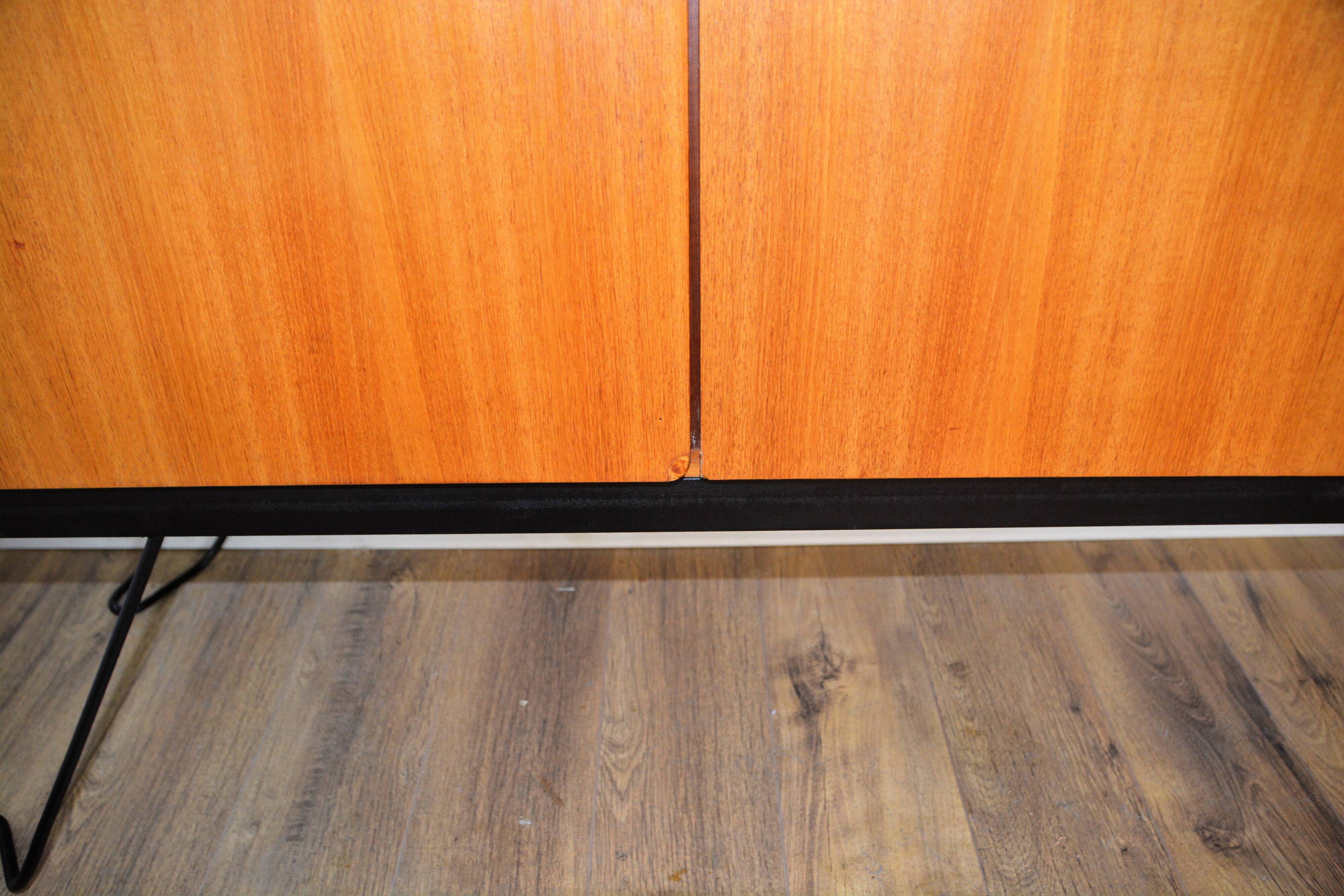 Scandinavian teak metal foot row