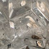 Round ceiling or wall lamp in worked glass. Gray metal support