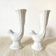 Pair of porcelain candle holders and bird vases