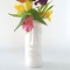 White glazed ceramic vase with face