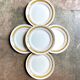5 St Amand flat plates in yellow and gold earthenware