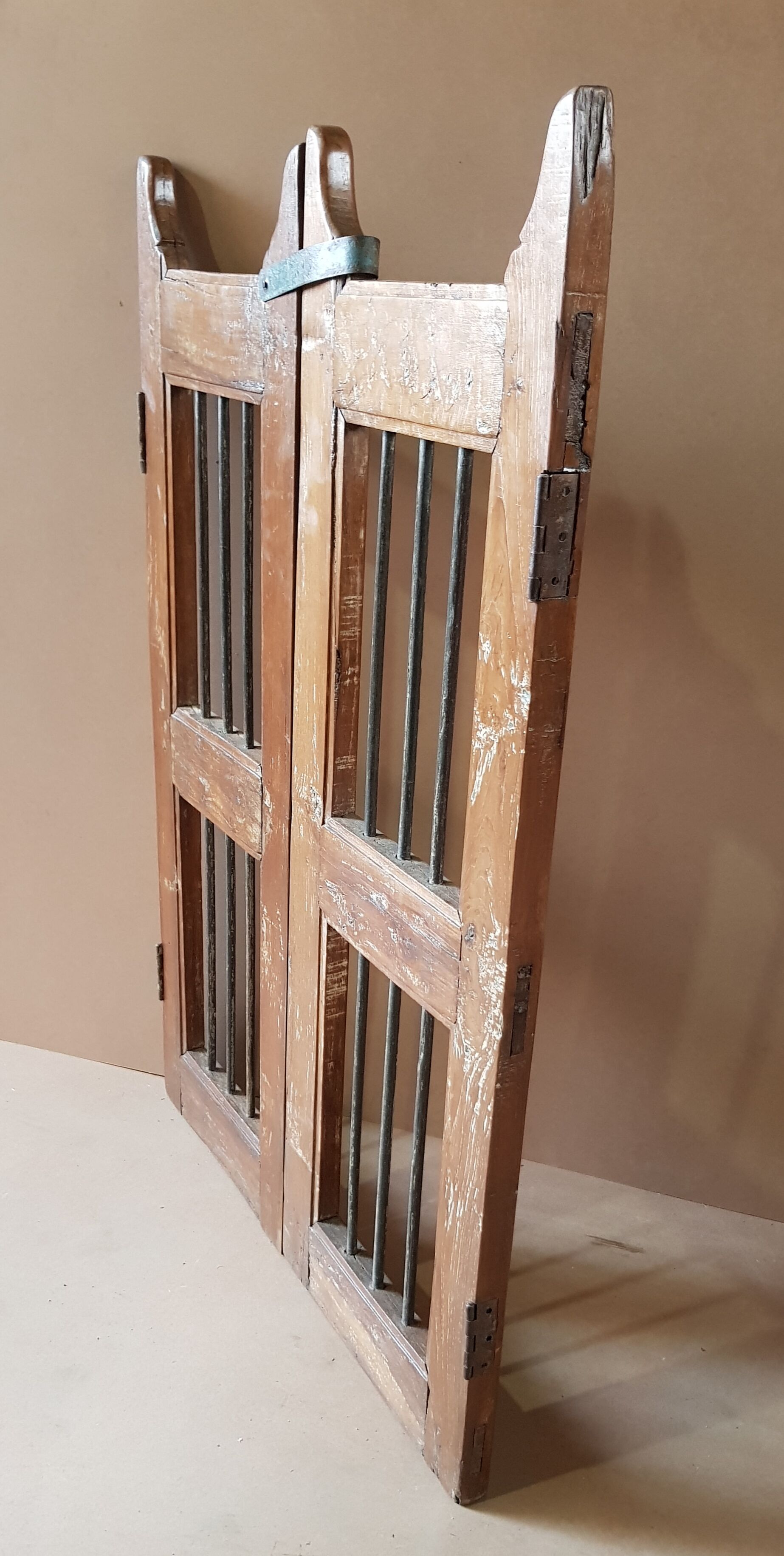 Old Burmese teak gate with openwork wrought iron panels