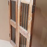 Old Burmese teak gate with openwork wrought iron panels