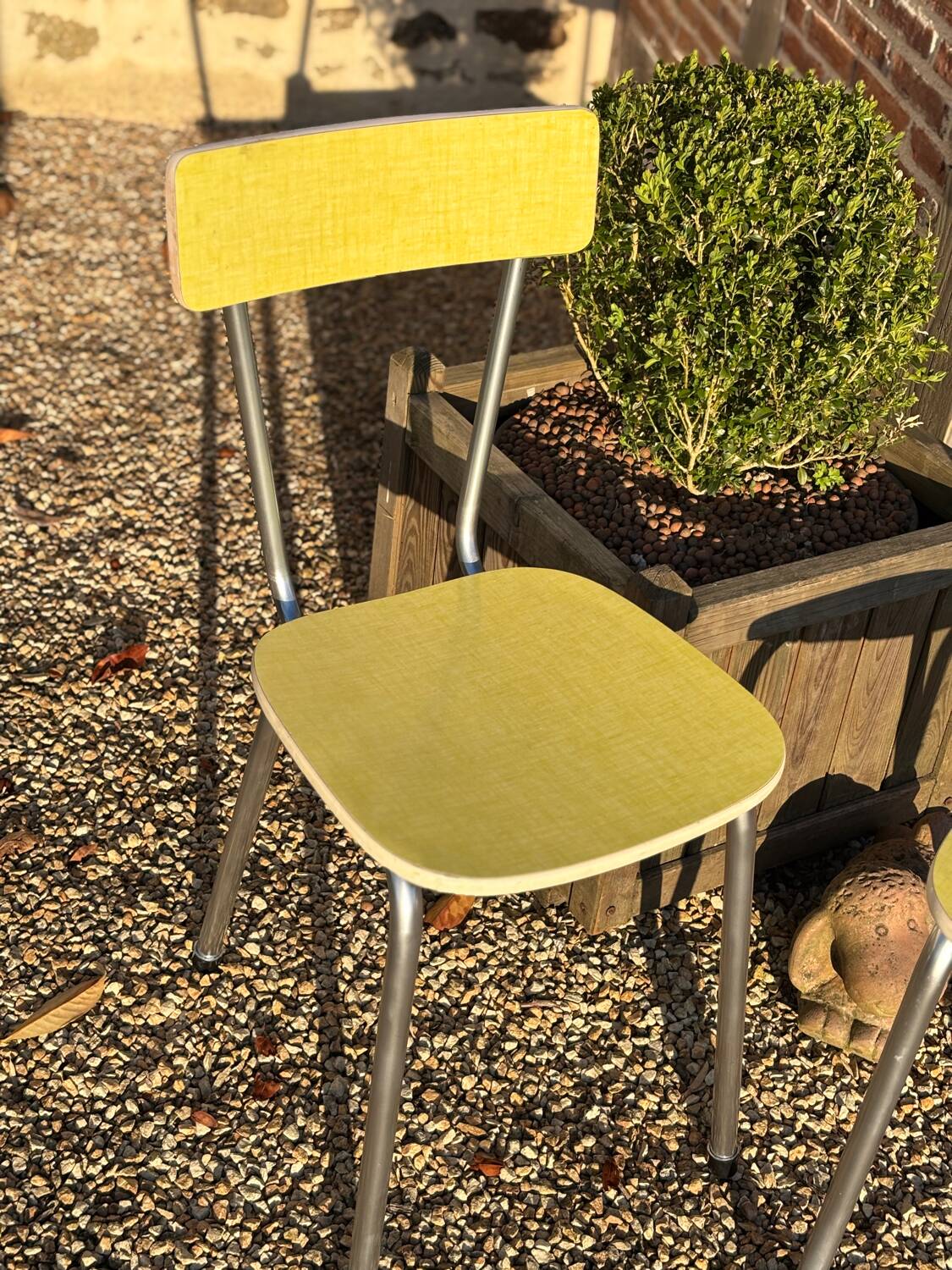 Pair of yellow Formica chairs