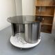 Vintage metal and smoked glass coffee table on casters bar