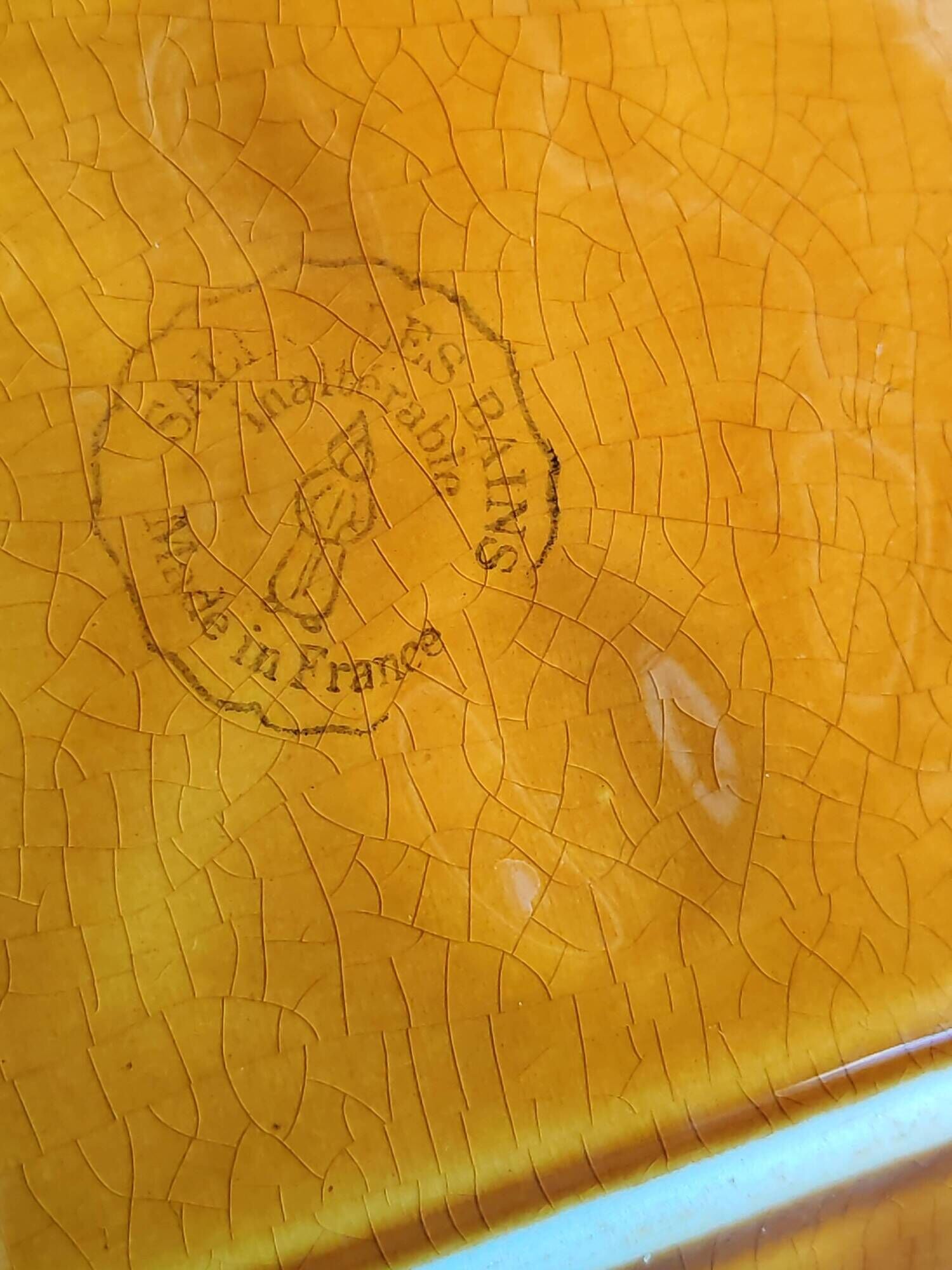 Vintage barbotine pocket dish from Salins les Bains, relief decoration of fruits.