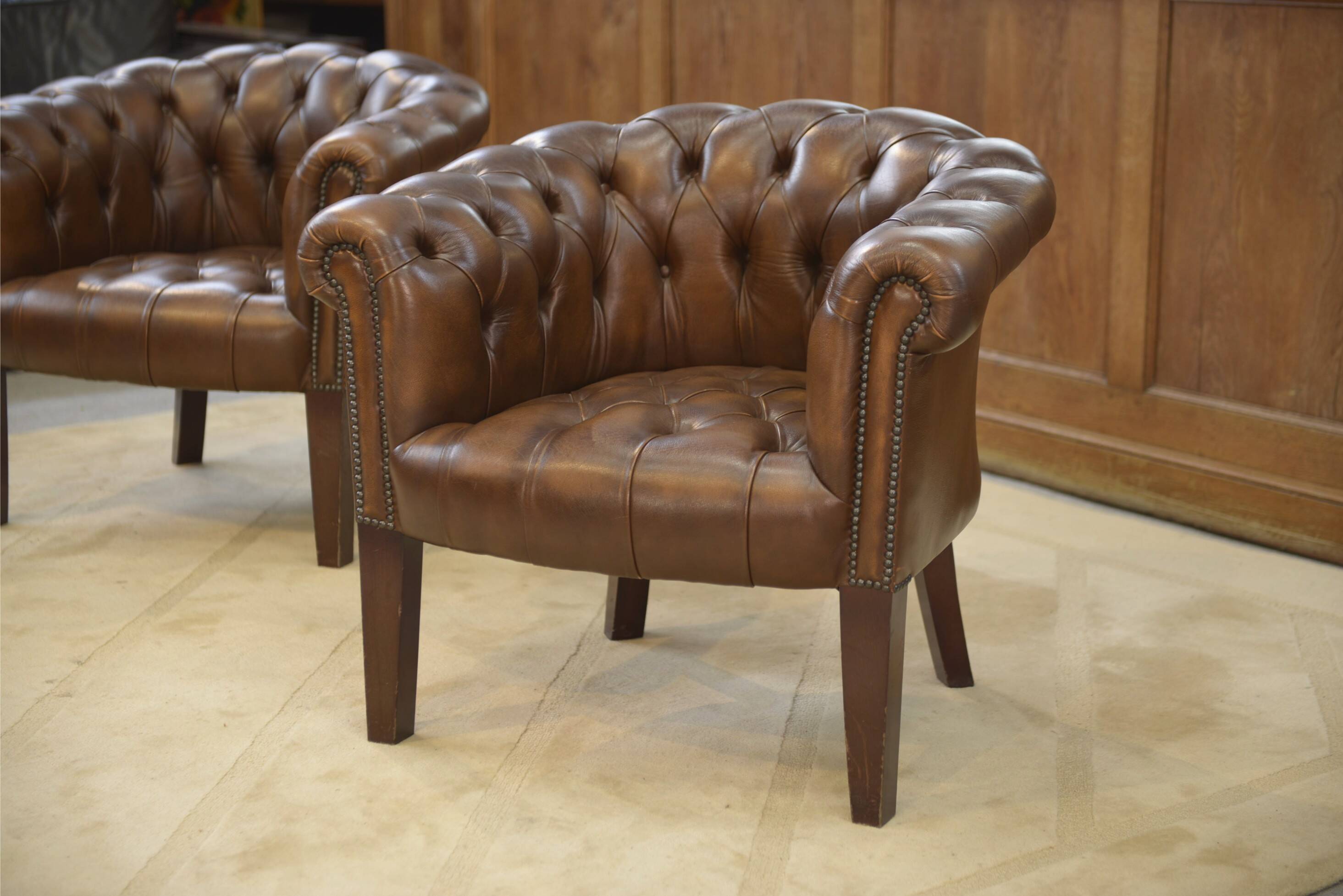 Pair of upholstered leather Club armchairs