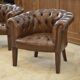 Pair of upholstered leather Club armchairs
