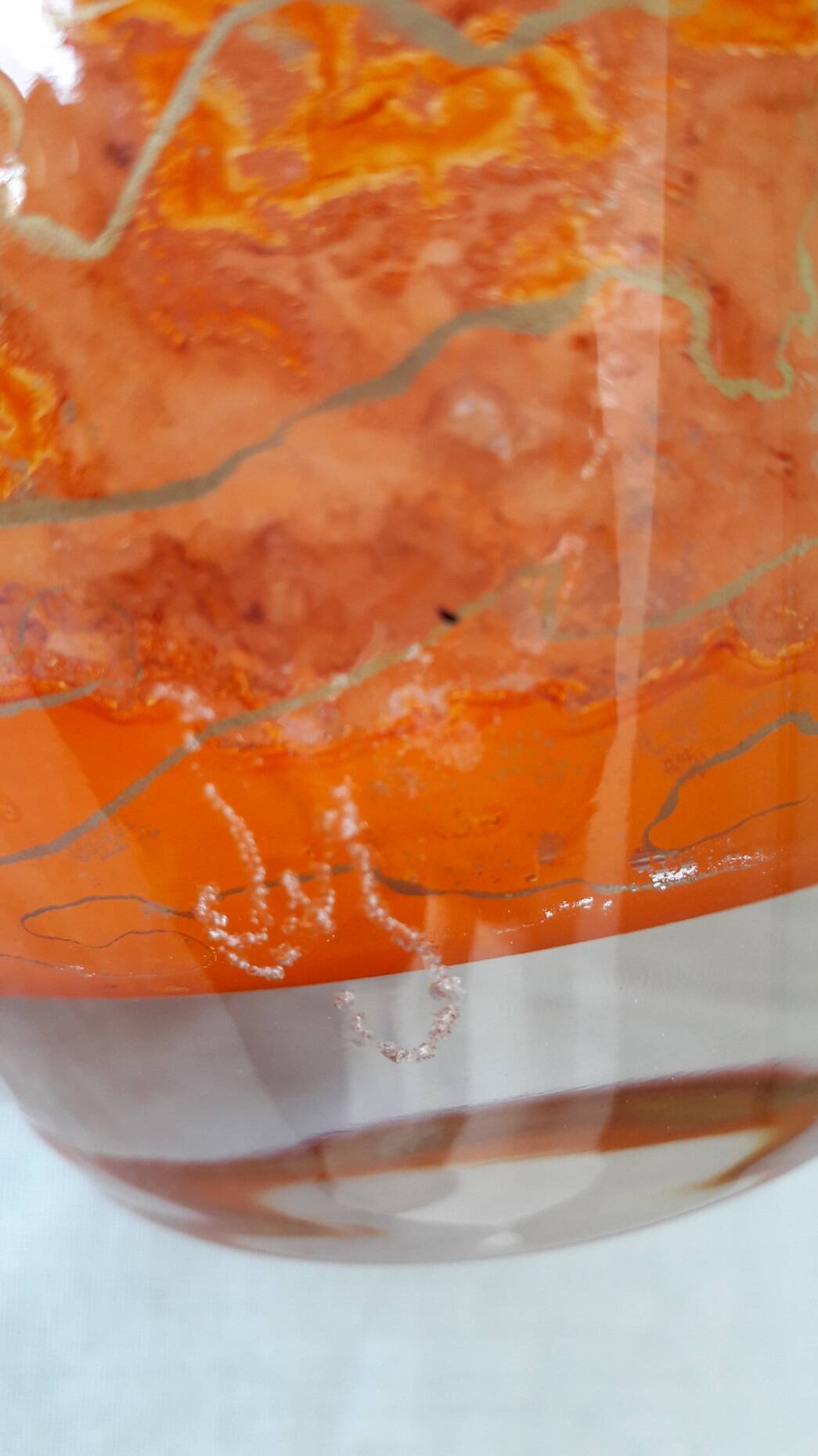 Signed orange vase