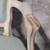 Pair of Louis XV style armchairs in patinated wood, light blue fabric.