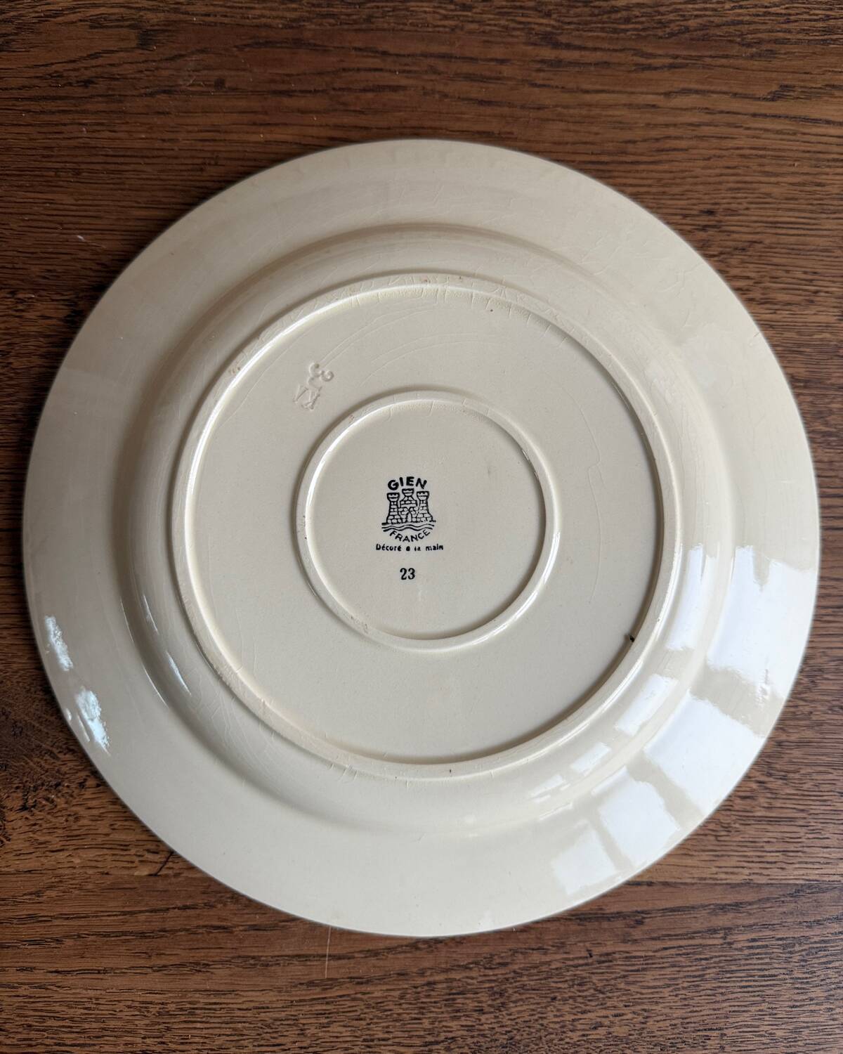 Round flat iron earth Gien dish