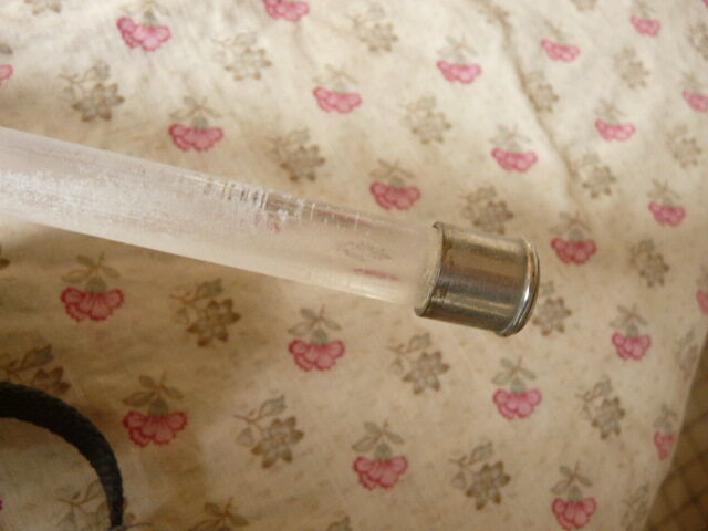 Chromed metal towel rack and glass rod