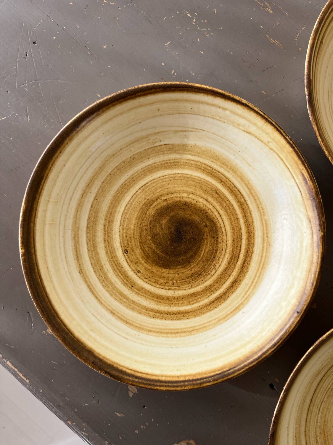 Lot de 4 assiettes creuses signées Longchamp