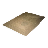 Brown flat-woven jute Indian rug, 1970.