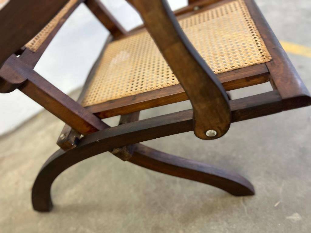 Antique folding chair with weaved seat/back