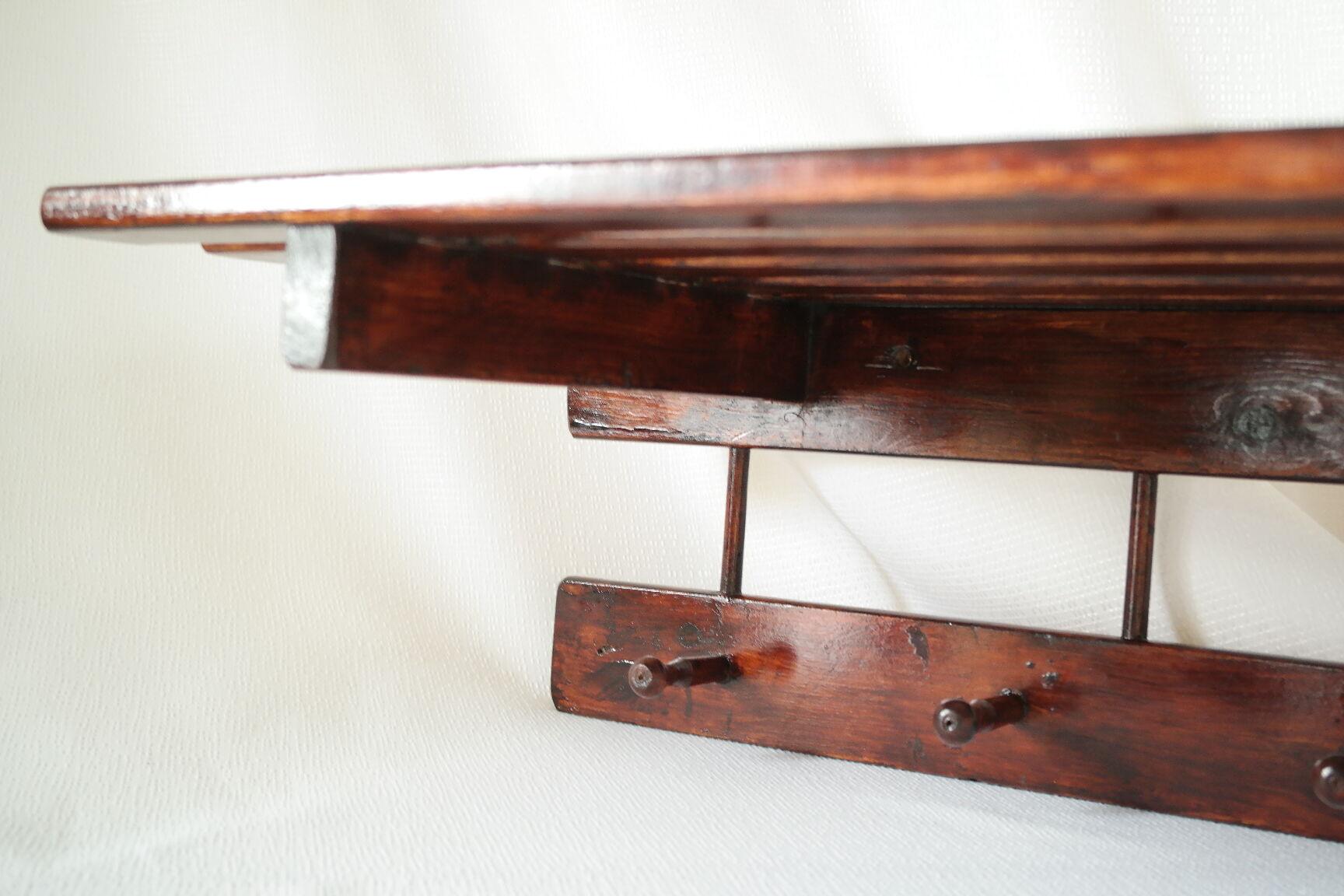 Vintage dark wood wall coat rack