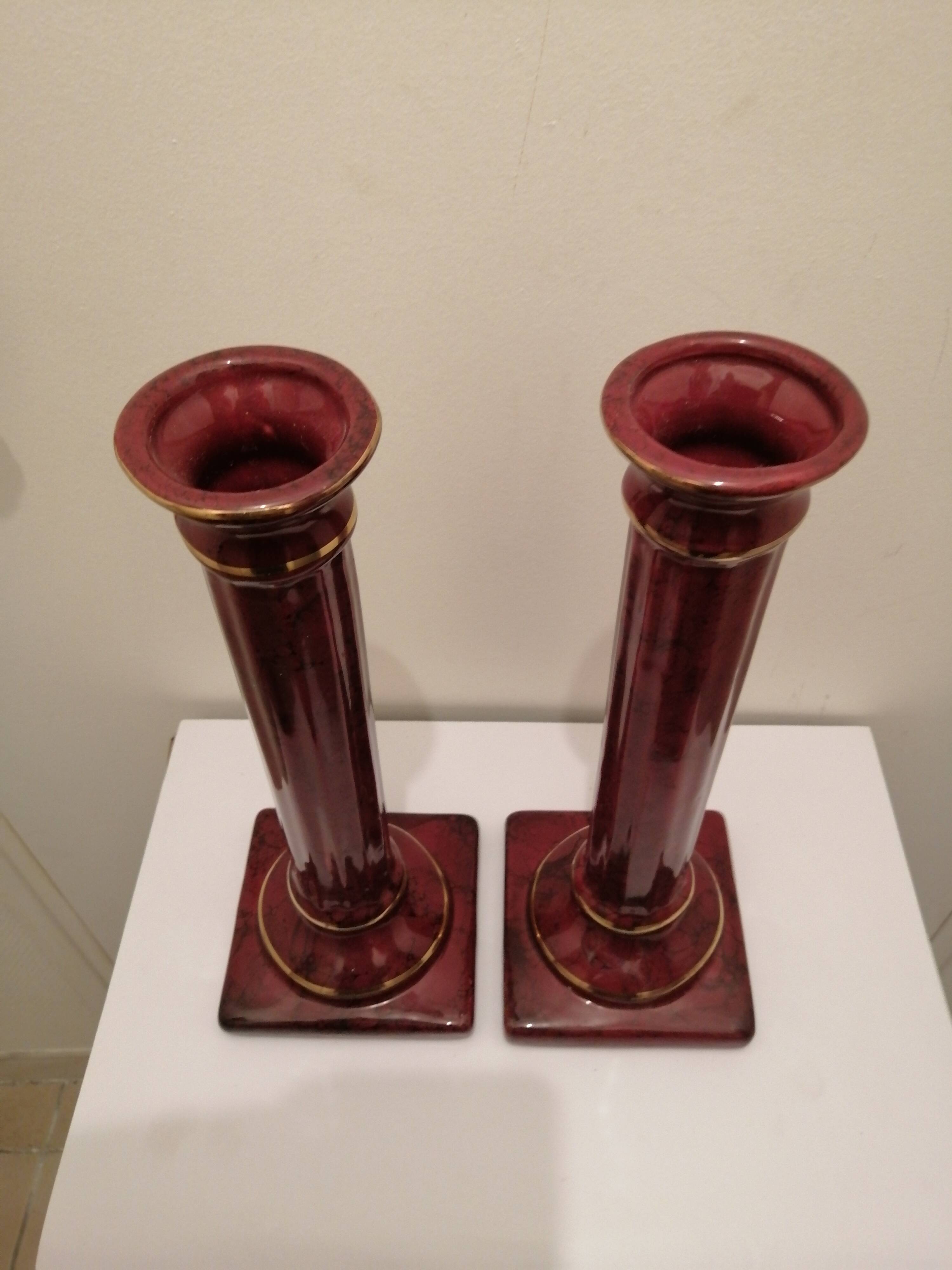 PAIR OF CERAMIC TORCHES