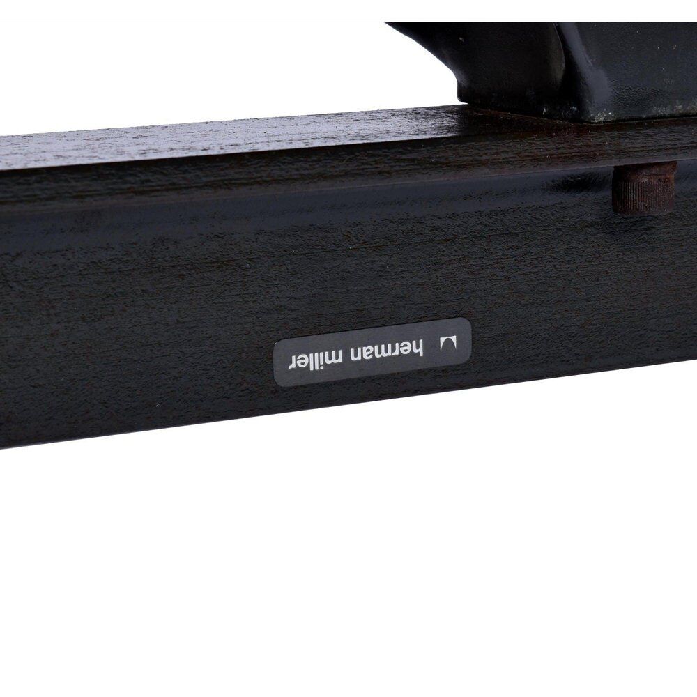 Tandem bench with brown Naugahyde pad shell chairs by Charles and Ray Eames for Herman Miller