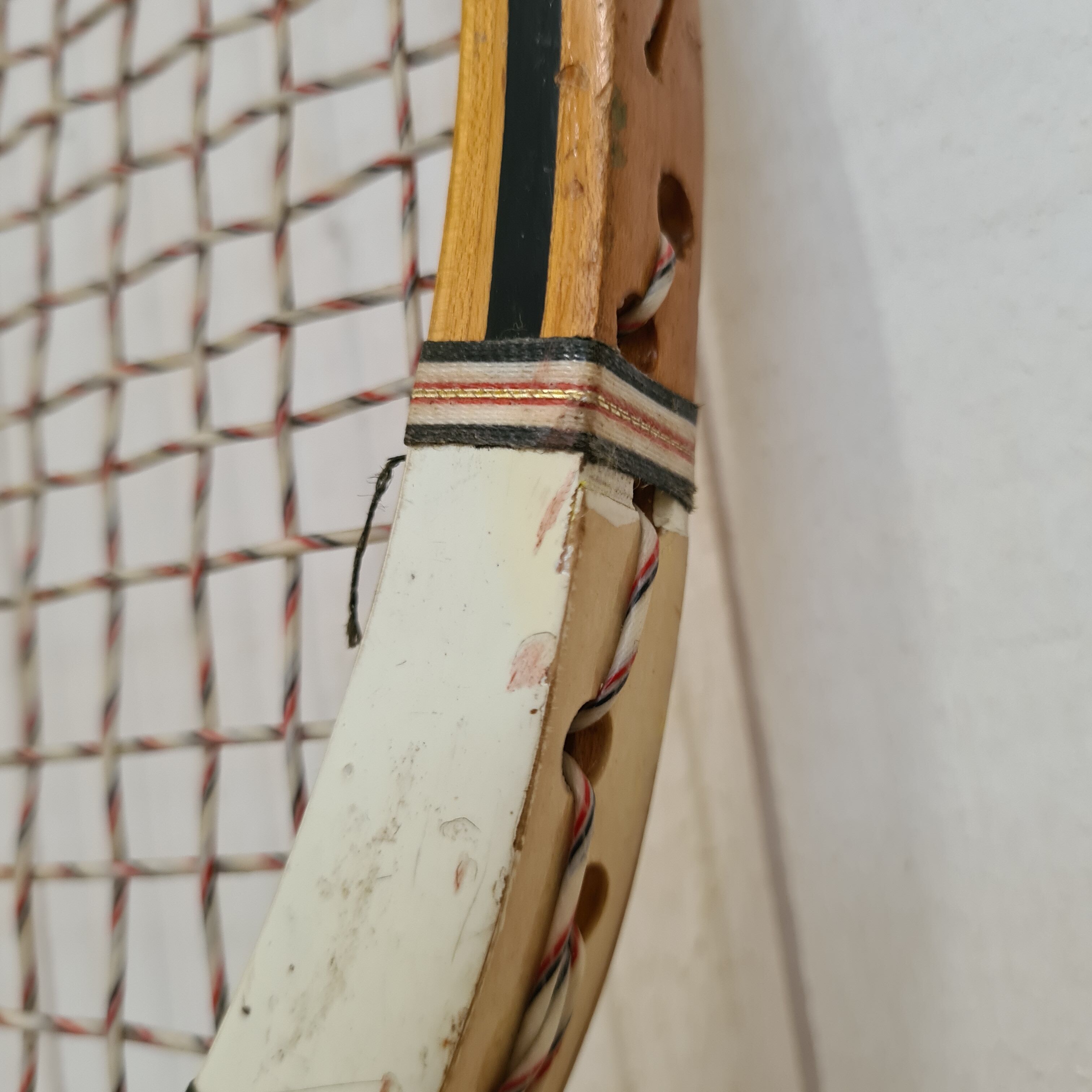 Vintage tennis racket with wooden press