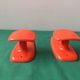 Pair of Patère coat rack Syla France plastic orange design 70s