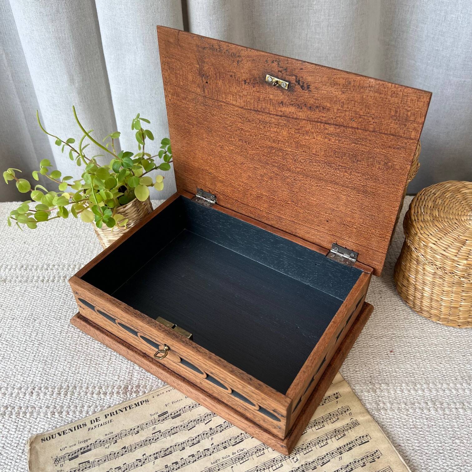 Carved wooden box with key