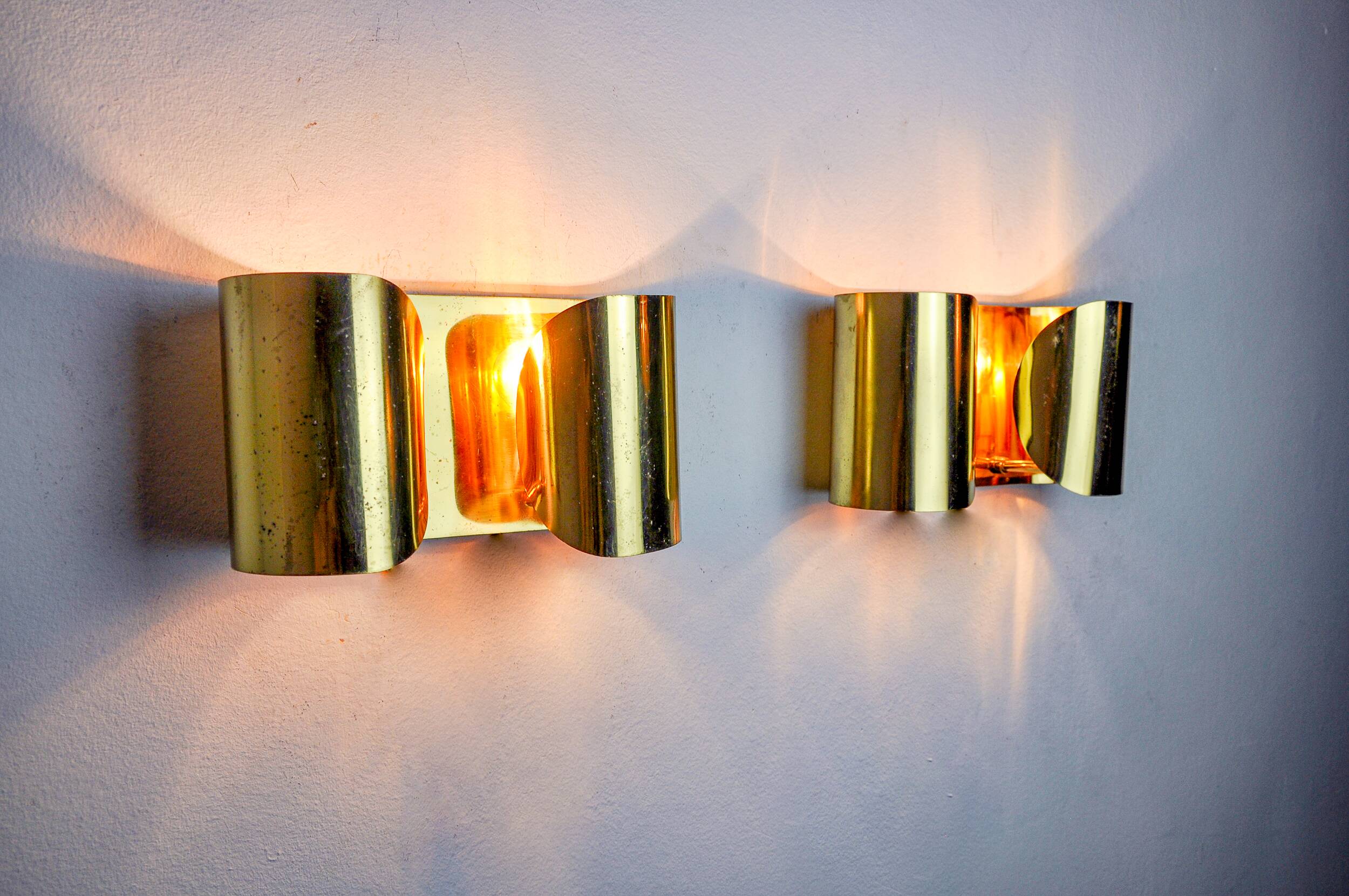 Pair of "Foglios" brass wall lights, Italy, 1970