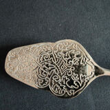 Engraved metal cake pliers