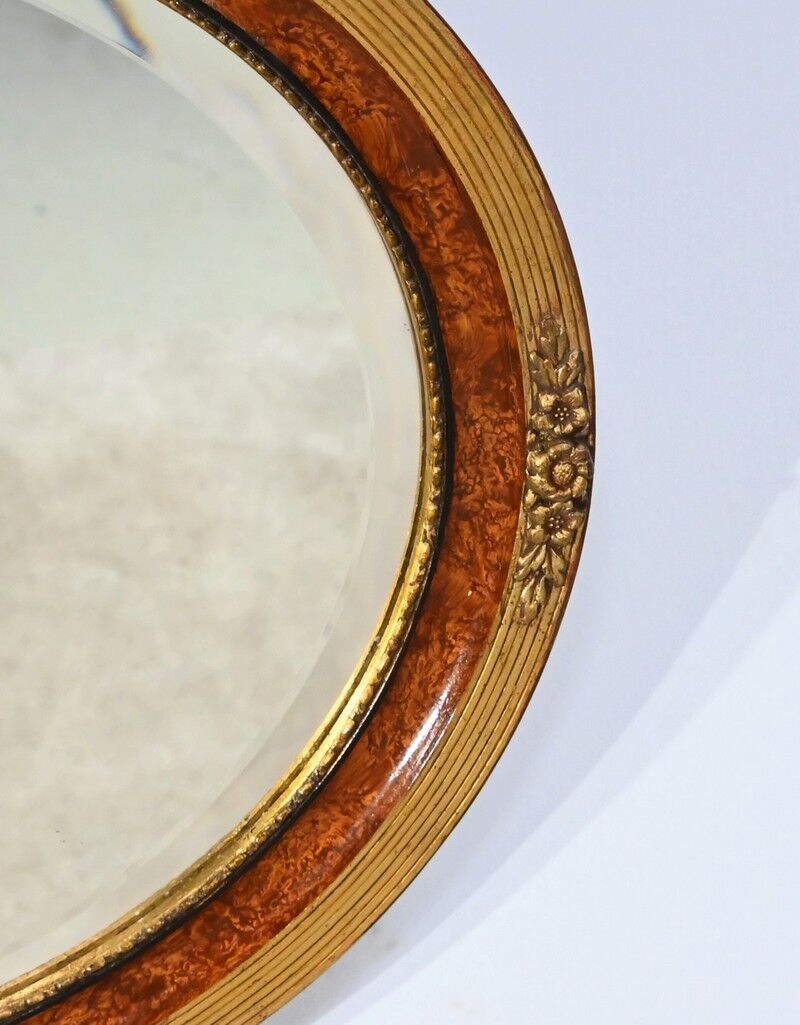 Oval mirror in gilded wood – early twentieth century