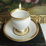 Tasse et soucoupe ancienne en porcelaine blanche et or XIXème avec poignée forme tête de cygne