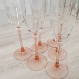 6 champagne flutes with pink stems