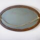 Large Art Deco oval mirror in carved wood - 87 x 53 cm