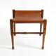 Rare 1990s safari stool with a teak frame and a seat made of brown saddle l