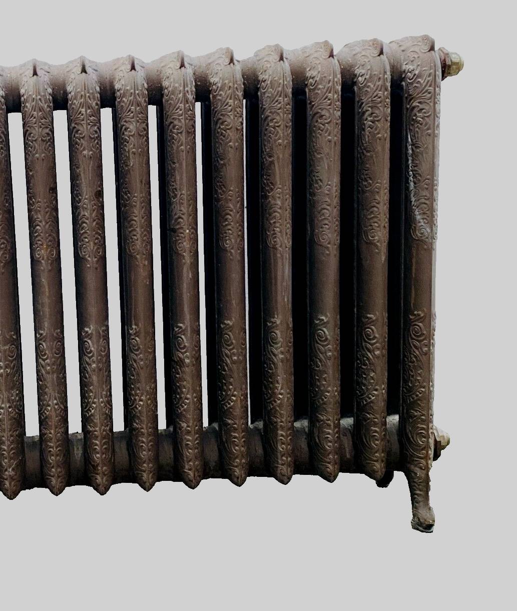 Radiateur ancien a lames fleuries en fonte de fer XX siècle
