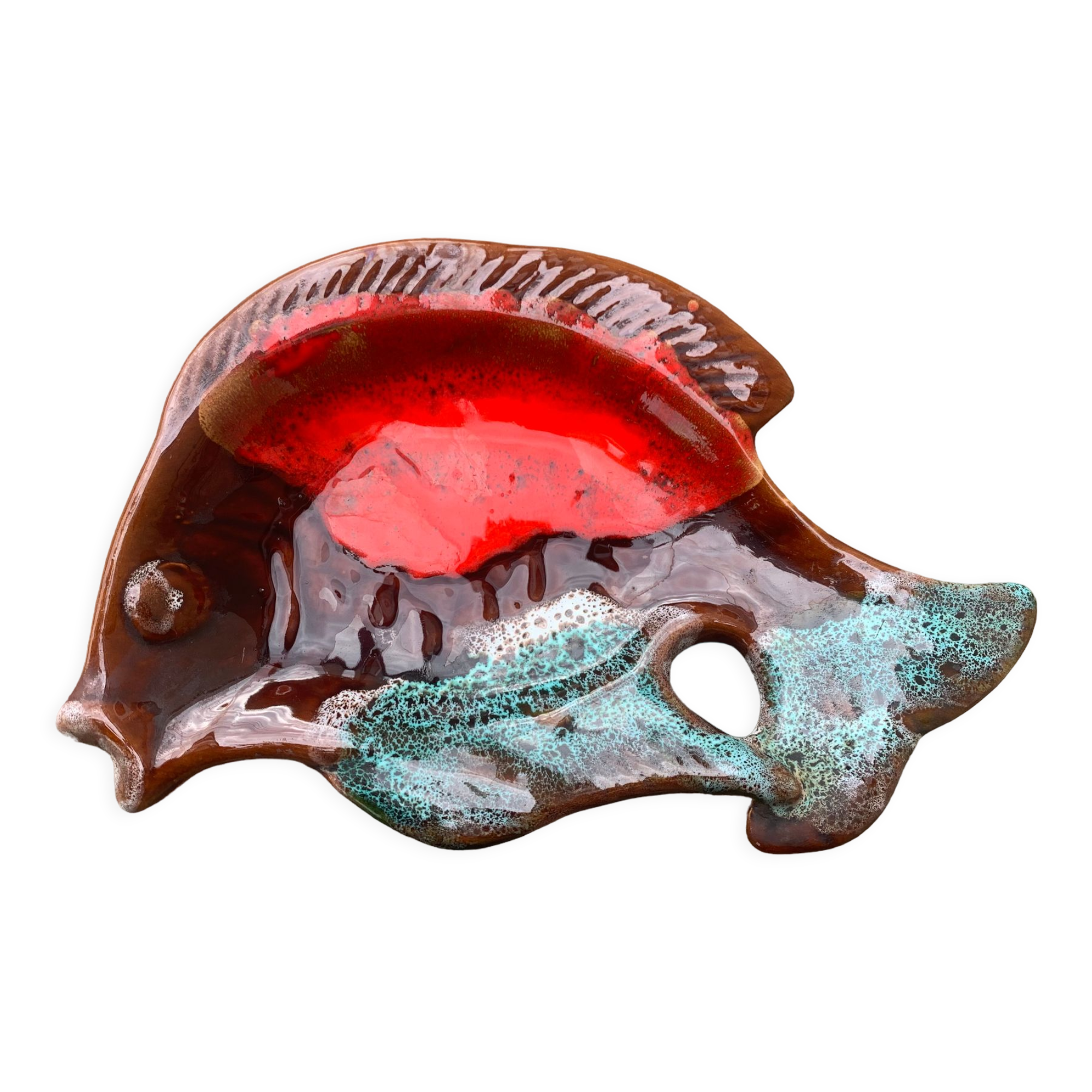 Empty pocket in glazed ceramic slip in the shape of vintage fish